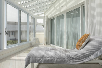 Bed in a white modern room