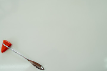 Percussion Hammer on a white table