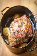 Roast pork shoulder with onion 