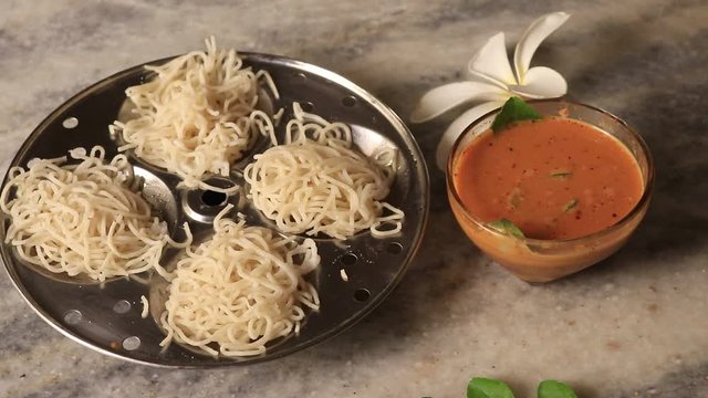 Idiyappam/ String Hoppers -Traditional Kerala Steamed Breakfast served with Chickpea (Kadala) curry top vew