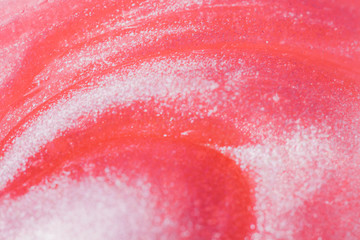 vaporwave style texture background: neon pink funky paint texture. Close up, flat lay.