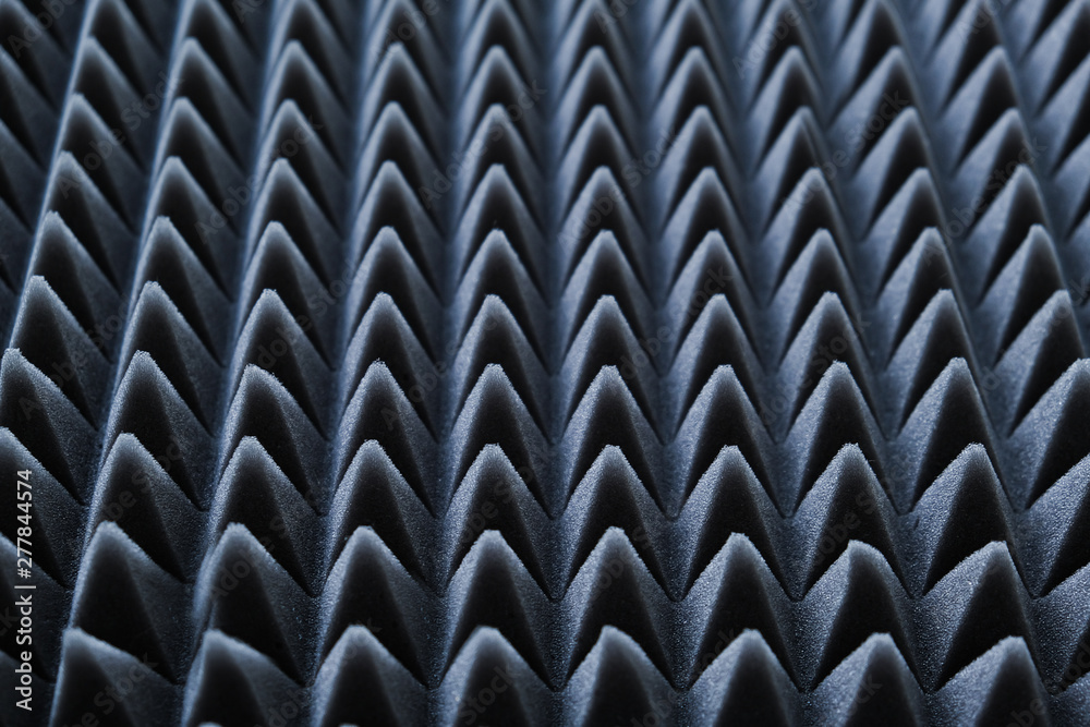 Wall mural Acoustic foam rubber, soundproofing. Noise-suppressing material. Material for noise suppression in rooms and music studio. Gray triangles texture