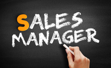 Sales Manager text on blackboard, business concept background