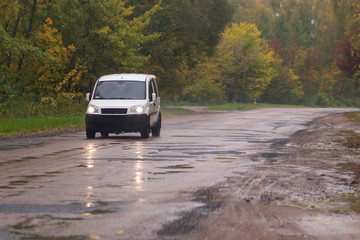 Obraz na płótnie Canvas Autumn scene with road