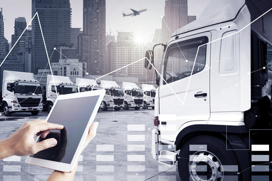 Technology transportation by people is using tablet to control trucking transportation mode for logistics.