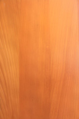 Wood texture background. Warm yellow reddish tint of wood to create a cozy mood