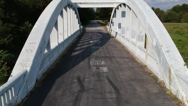 Rainbow Bridge on historic Route 66, near Baxter Springs Kansas. People from all over the world still travel over this bridge as they get their kicks on route sixty six. Short video.