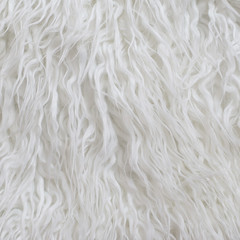 Close up white fluffy fur texture background. Square crop, top view