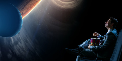 Businessman watching TV