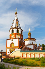 Fototapeta na wymiar Beautiful old Epiphany Cathedral of 1741 is an architectural symbol of the city of Irkutsk. Summer cityscape