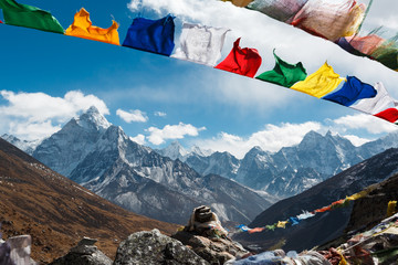 Evverest trekking. Beautiful view of the valley of Nepal. In the frame of the mountain and prayer...