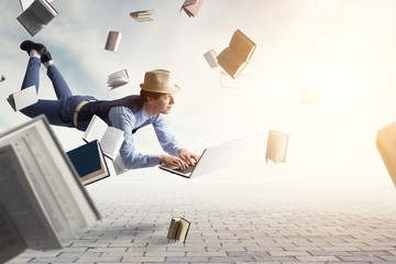 Smiling joyful levitating young man. Mixed media