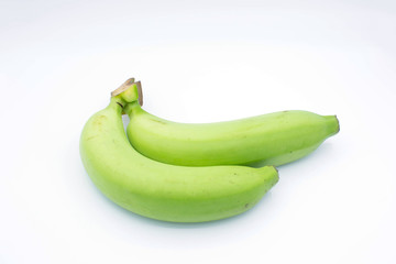 Green bananas on white background.