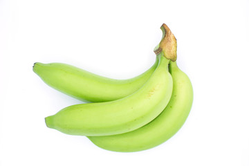 Green bananas on white background.