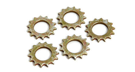 metal gear wheels on white ground