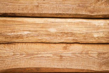 Old natural uncolored wooden wall surface. Background photo texture