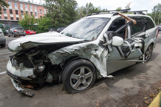 a completely wrecked car after a serious accident,.ruined car