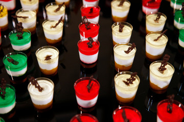 Colorful desserts and pastry served on a wedding party