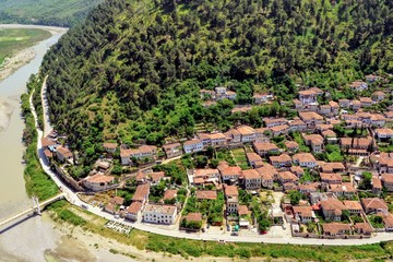 Obraz premium The albanian ancient city of Berat, designated a UNESCO World Heritage Site in 2008. Top view from the Berat Castle to Gorica quarter and Osum (Osumi) river