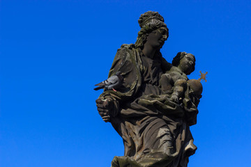 Fototapeta na wymiar Statue on Charles bridge, Prague, Czech republic