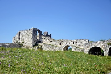 Obraz premium Ancient walls of the Berat Castle (Albanian: Kalaja e Beratit), a fortress overlooking the town of Berat, Albania. The albanian ancient city of Berat, designated a UNESCO World Heritage Site.