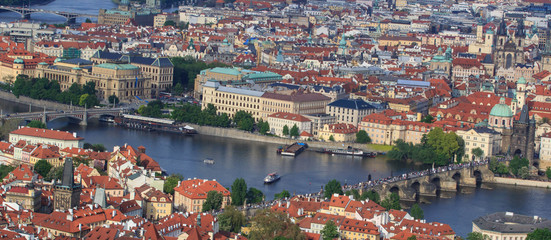 Fototapeta na wymiar Top view of the old beautiful city with the river and bridges. Prague