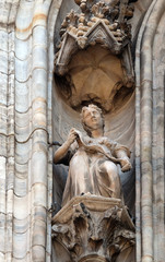 Obraz premium Statue of Saint on the facade of the Milan Cathedral, Duomo di Santa Maria Nascente, Milan, Lombardy, Italy