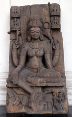 Fototapeta na wymiar Seated Tara, from 10th century found in Khondalite Lalitagiri, Odisha now exposed in the Indian Museum in Kolkata, West Bengal, India 