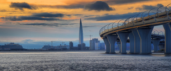 Panorama of the Western high-Speed Diameter in St. Petersburg at sunset