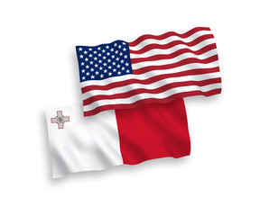 National vector fabric wave flags of Malta and USA isolated on white background. 1 to 2 proportion.