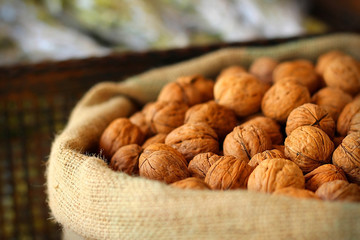 Walnuts in bag close-up, selective fokus.