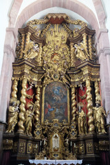 Fototapeta na wymiar Assumption of Mary, main altar in Cistercian Abbey of Bronnbach in Reicholzheim near Wertheim, Germany