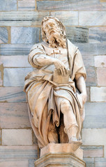 Obraz premium Statue of Saint on the facade of the Milan Cathedral, Duomo di Santa Maria Nascente, Milan, Lombardy, Italy