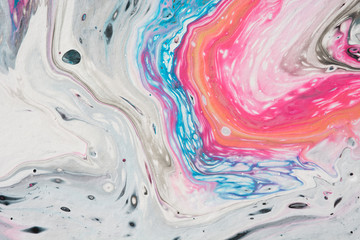 Fluid art. Abstract colorful white and pink liquid acrylic pattern.