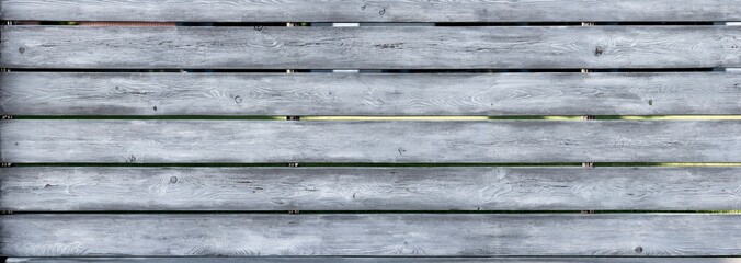 Bleached wood planks of fence texture