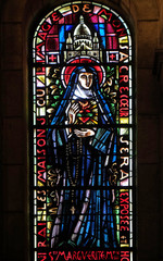 Saint Margaret Mary Alacoque, stained glass window in Basilica of the Sacre Coeur, dedicated to the Sacred Heart of Jesus in Paris, France 