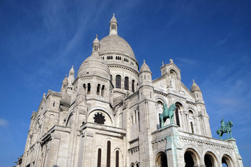 Fototapeta na wymiar Basilica of the Sacre Coeur, dedicated to the Sacred Heart of Jesus in Paris