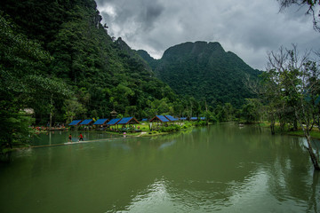 Beautiful day around the fields and the dirt roads of Vang Vieng area in Laos.  This place feels out of this world , full of green mountains and rice fields , blue lagoons and rivers.  