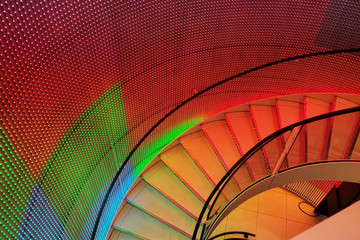 Fototapeta premium Colorful light bulbs on the wall of Sephora's store in Paris, France 