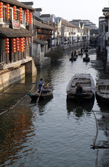 Fototapeta na wymiar Tourist boats on the water canals of Xitang Town in Zhejiang Province, China