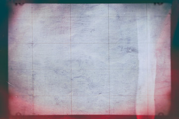 Blank grained and scratched film strip texture background