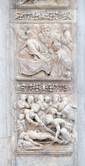 Isaac blesses Jacob by Ercole Seccadenari up and Burial of Jacob's wife by Amico Aspertini, left door of San Petronio Basilica in Bologna, Italy