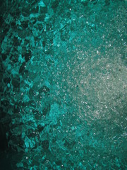 Small air bubbles in the water. Underwater background. Aquamarine bubbles. Water splash. Turquoise bubbles. Aquamarine water. Turquoise water.