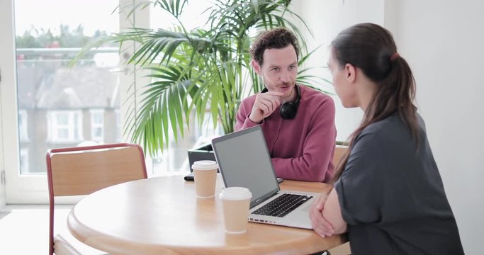 Freelancers having a meeting in a coworking space