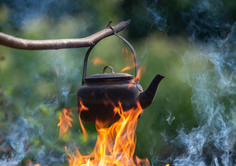 Coffee pot on camp fire