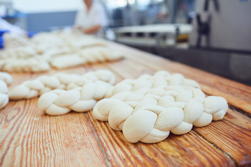 Raw bread on table in bakery