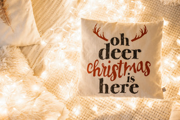 decorative pillow with an inscription in the lights. concept for Christmas, New Year