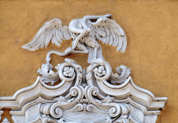 Fototapeta premium Beautiful house facade with carved stone animals in Mantua, Italy 