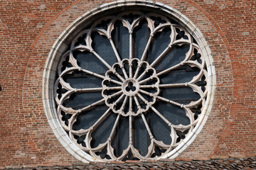 Rose window on Saint Francis church in Mantua, Italy 