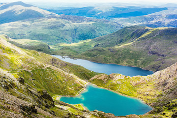 View of beautiful blue lakes in Snowdonia National Park, North Wales, mountains on the back, selective focus